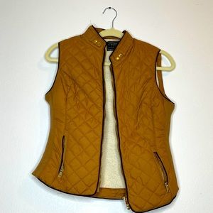 Faux leather, cozy lined vest. Small